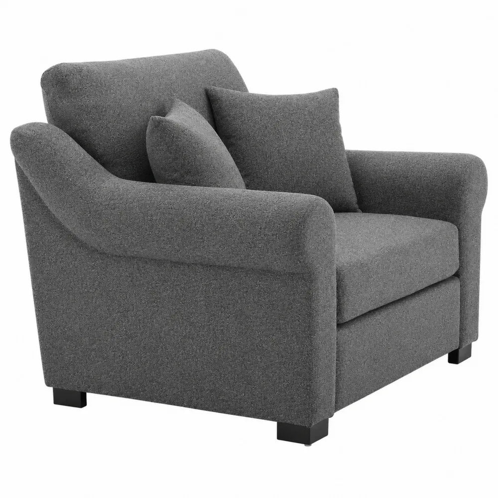 Poltrona in tessuto grigio con cuscini